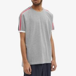 Thom Browne Raglan Grosgrain Striped Tee 7 Thom Browne Raglan Grosgrain Striped Tee -Jamiesons Shop 03 12 2021 AJ MJS112A 00050 055 7 1